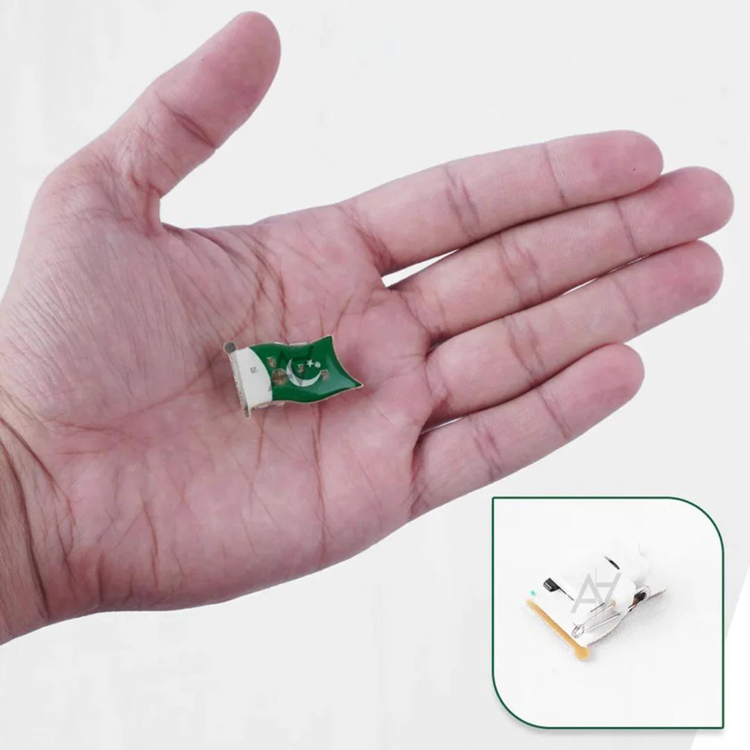 Small flag-shaped object held in a hand with an inset showing a close-up.